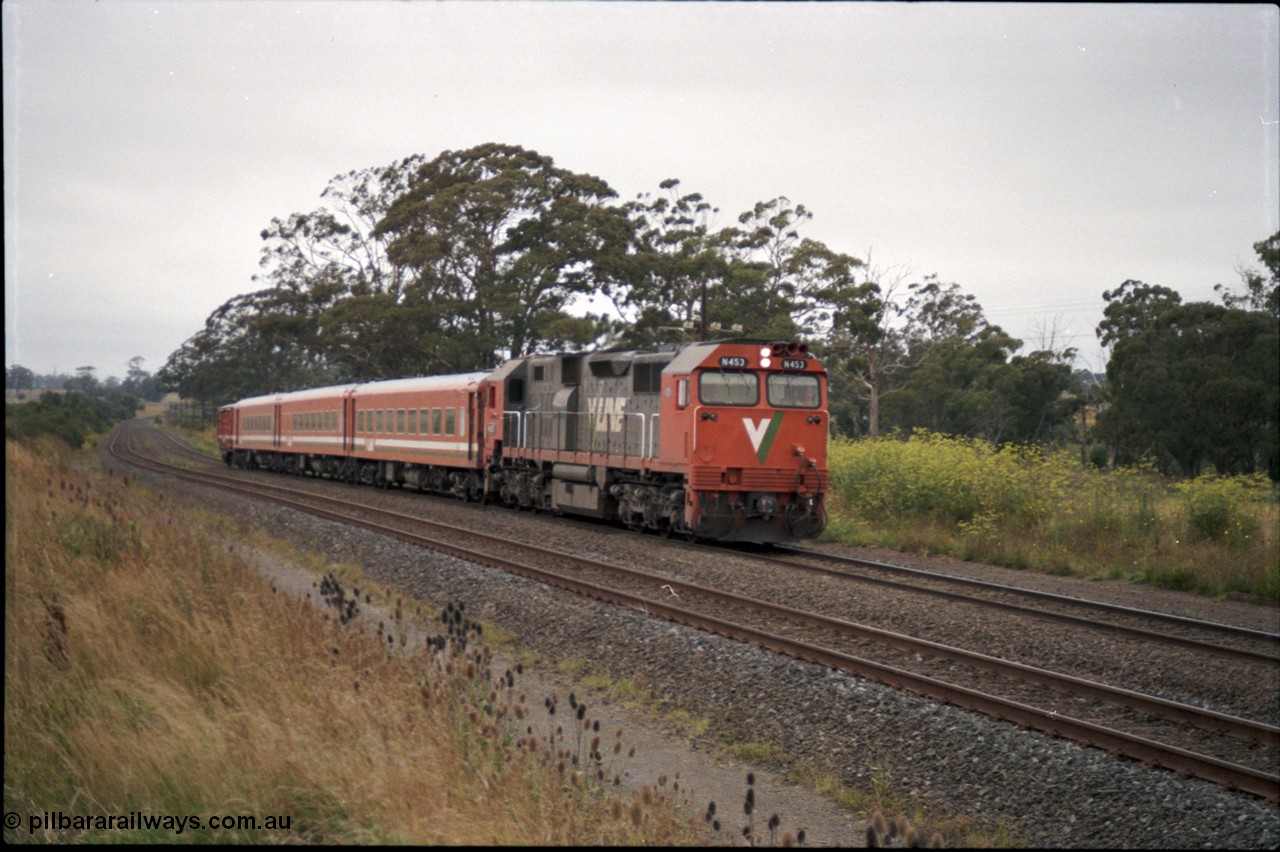 172-11
Bungaree Loop, broad gauge V/Line N class N 453 'City of Albury' a Clyde Engineering EMD model JT22HC-2 serial 85-1221 and N set, down passenger train.
Keywords: N-class;N453;Clyde-Engineering-Somerton-Victoria;EMD;JT22HC-2;85-1221;