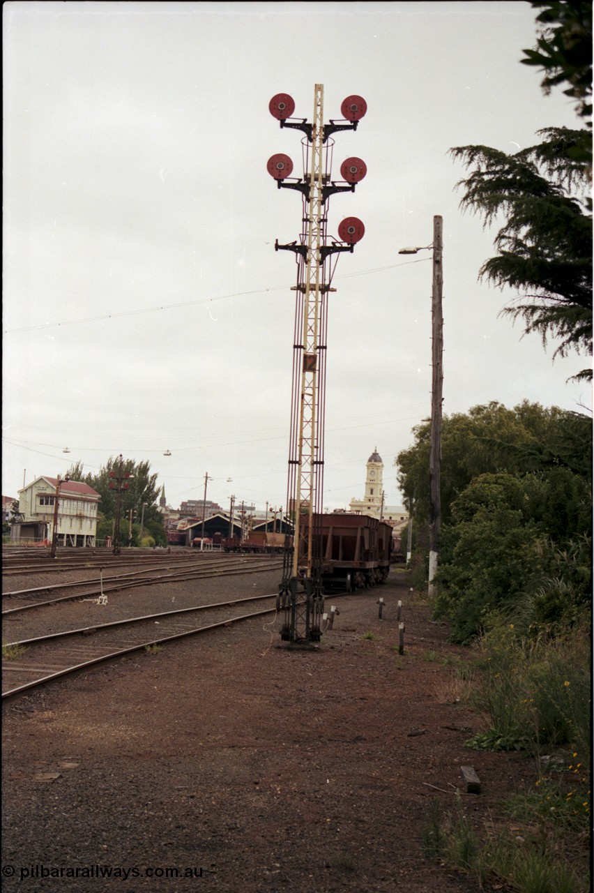 172-18
Ballarat yard view, disc signal post 12, station clock tower in background and Ballarat A signal box at left.
