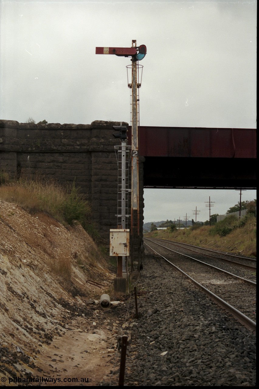 172-24
Ballarat East, semaphore signal post 2, looking east towards Warrenheip, Queen Street overbridge, new electric colour light signal installed.
