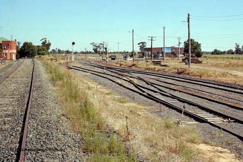 173-20
Murchison East, yard overview looking south, point levers and points, track work, taken from the gravitation road, Railway Hotel at left, mainline showing signs of recent works.
