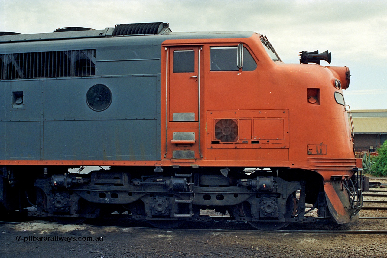 174-08
Wodonga, loco depot, turntable radial roads, V/Line broad gauge Bulldog locomotive A class A 70 Clyde Engineering EMD model AAT22C-2R serial 84-1187 rebuilt from B class B 70 Clyde Engineering EMD model ML2 serial ML2-11, cab side shot.
Keywords: A-class;A70;Clyde-Engineering-Rosewater-SA;EMD;AAT22C-2R;84-1187;rebuild;bulldog;