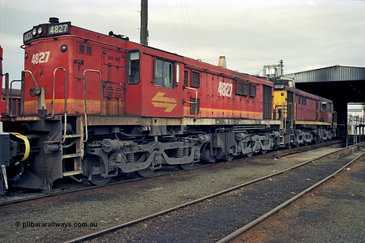 174-13
Albury loco depot, fuel point area, NSWSRA standard gauge 48 class locomotives in Candy livery 4827 AE Goodwin ALCo model DL531 serial 83822 and Tuscan liveried 4803 AE Goodwin ALCo model DL531 serial 83703.
Keywords: 48-class;4827;AE-Goodwin;ALCo;DL531;838222;