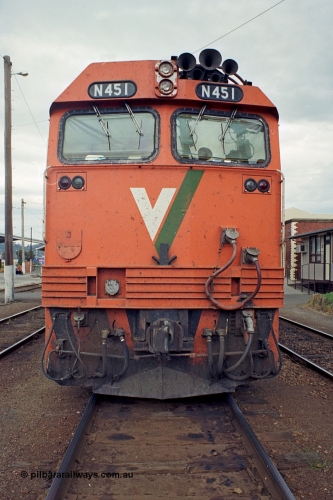 174-03
Wodonga, V/Line broad gauge locomotive N class leader N 451 'City of Portland' Clyde Engineering EMD model JT22HC-2 serial 85-1219 with flag holder mounted below the V/, front view.
Keywords: N-class;N451;Clyde-Engineering-Somerton-Victoria;EMD;JT22HC-2;85-1219;