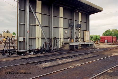 174-05
Wodonga, loco depot, fuel point canopy, showing fuel line and nozzle, hose reels etc. The grounded B vans in the background are for the examiners siding.
