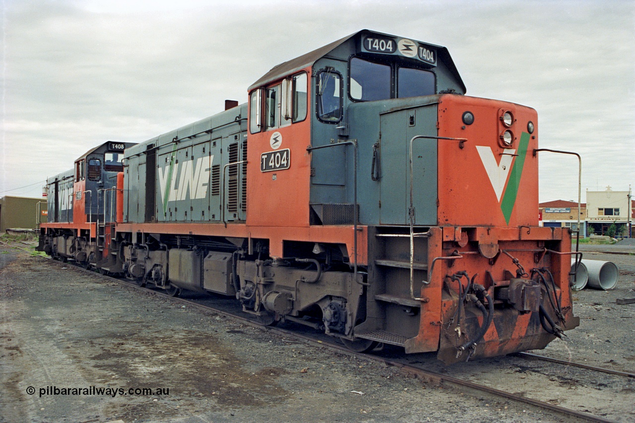 175-02
Shepparton, yard view with V/Line broad gauge T class locomotives T 404 Clyde Engineering EMD model G18B serial 67-499 and T 408 serial 68-624 stabled in the yard.
Keywords: T-class;T404;Clyde-Engineering-Granville-NSW;EMD;G18B;67-499;