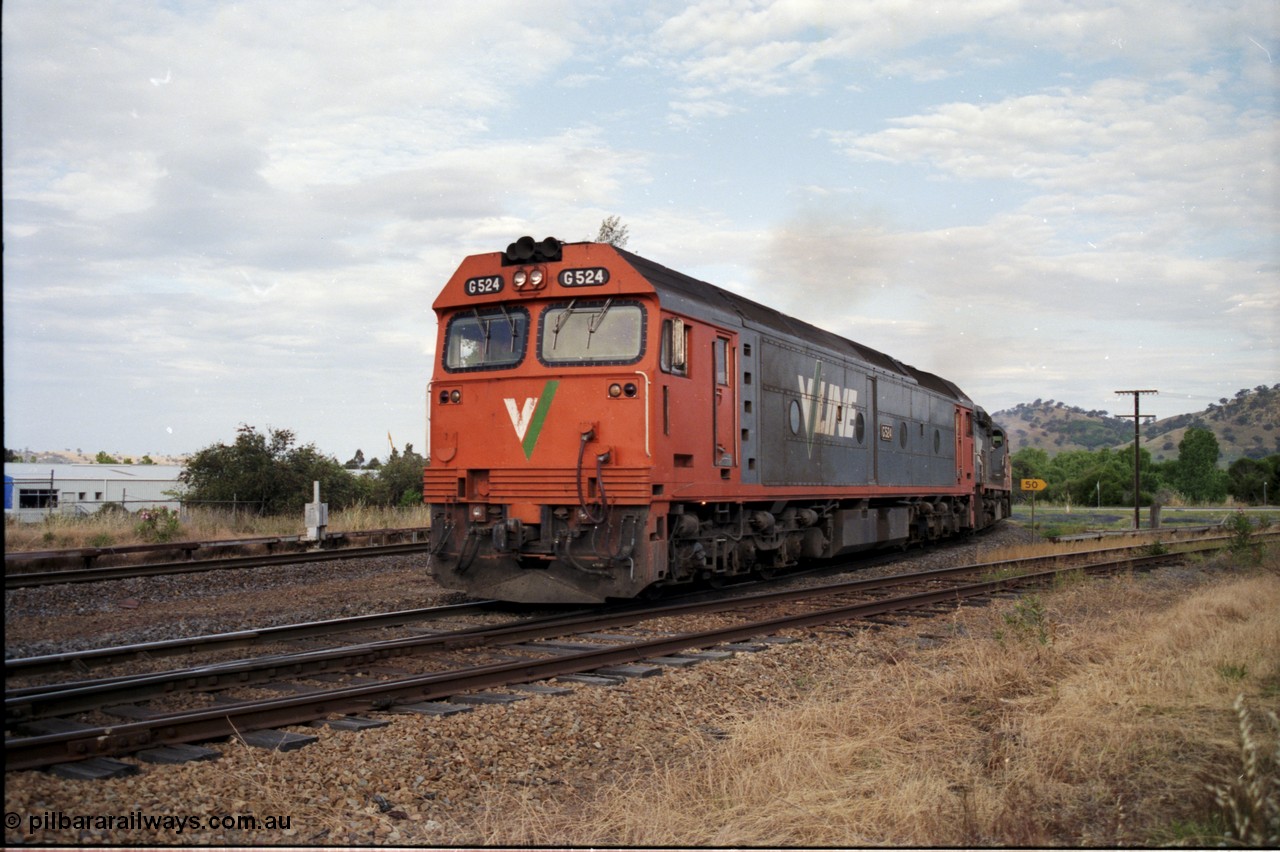 176-13
Wodonga, V/Line standard gauge up goods train behind the G class G 524 Clyde Engineering EMD model JT26C-2SS serial 86-1237 and C class C 505 Clyde Engineering EMD model GT26C serial 76-828 combination at the Bandiana junction, broad gauge track on the left, and the broad gauge line to Bandiana and former Cudgewa line curving around to the right.
Keywords: G-class;G524;Clyde-Engineering-Rosewater-SA;EMD;JT26C-2SS;86-1237;