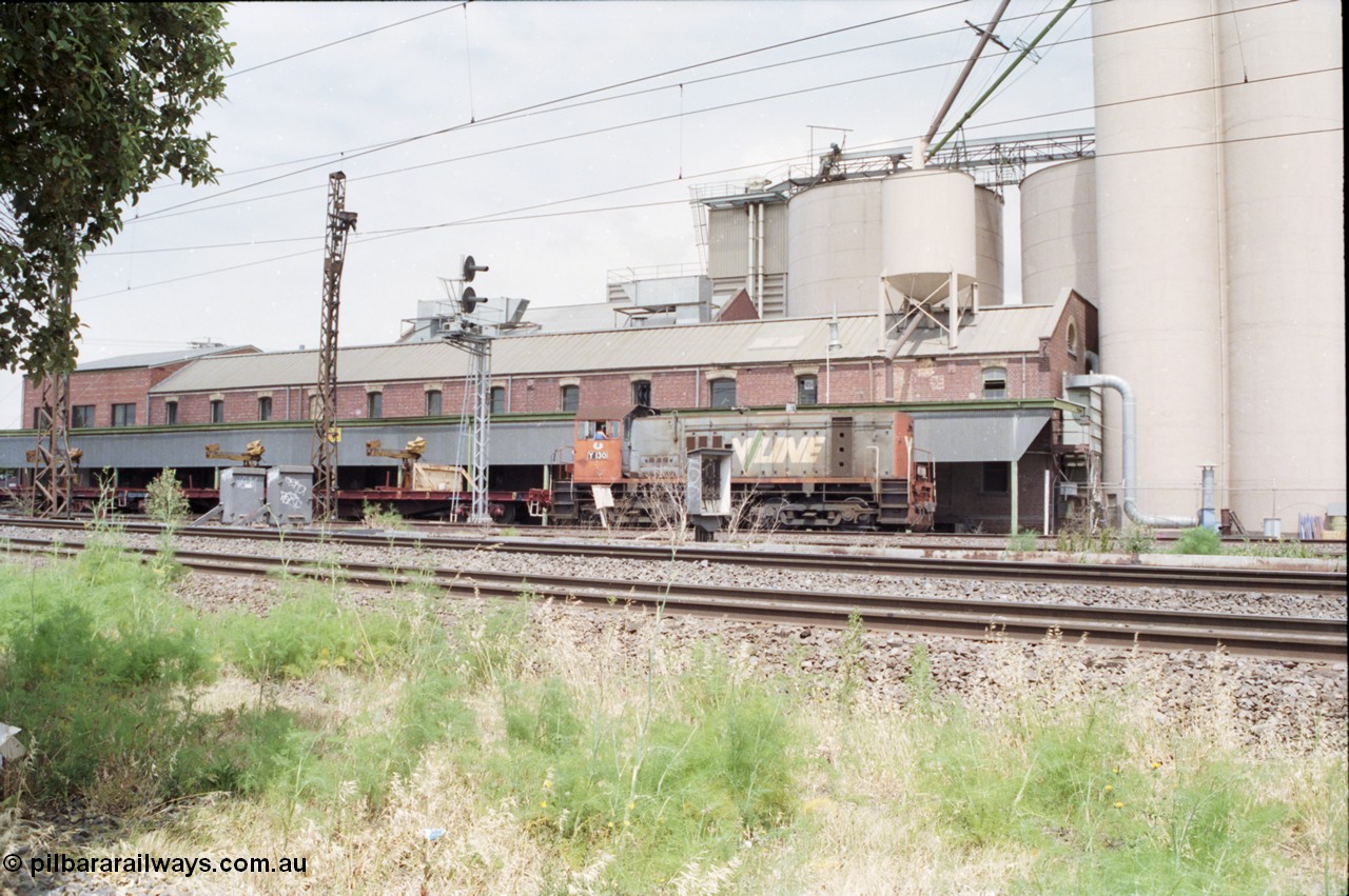 177-08
Newport Junction, V/Line broad gauge shunt locomotive Y class Y 130 Clyde Engineering EMD model G6B serial 65-396 leads a rail recovery train of VZRF class bogie welded rail transport waggons, along the Newport - Sunshine Loop Line in front of the Victorian Oatgrowers Pool Siding.
Keywords: Y-class;Y130;Clyde-Engineering-Granville-NSW;EMD;G6B;65-396;