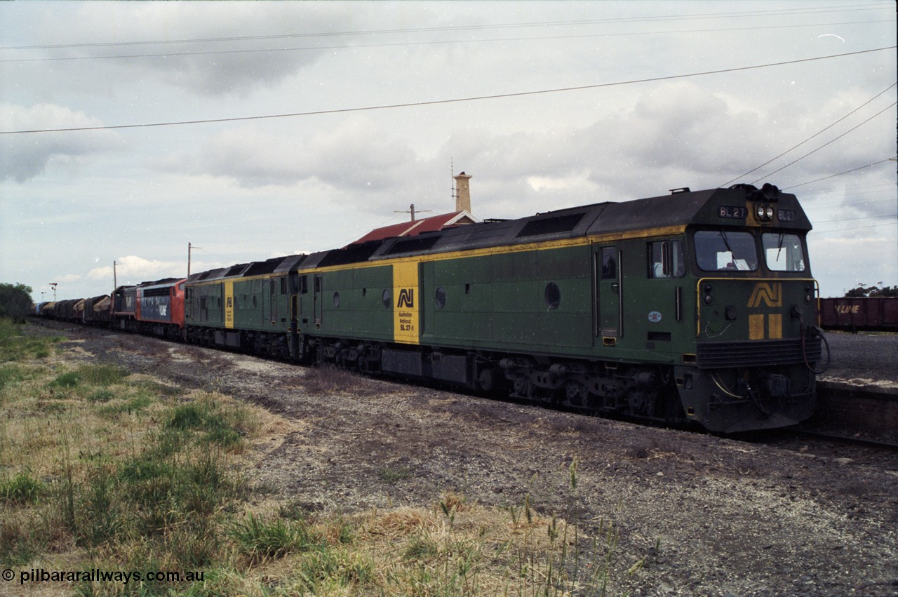 177-18
Gheringhap, down V/Line broad gauge goods train to Adelaide 9169 with the quad power combo of a pair of Australian National BL class locomotives BL 27 Clyde Engineering EMD model JT26C-2SS serial 83-1011 and class leader BL 26 'Bob Hawke' serial 83-1010 and V/Line S class S 313 'Alfred Deakin' Clyde Engineering EMD model A7 serial 61-230 and X class X 53 Clyde Engineering EMD model G26C serial 75-800, BL 27 had Paul Keating drawn on the LHS cab as it was just after he'd taken the Labor Party leadership and the Prime Ministership off Bob Hawke.
Keywords: BL-class;BL27;Clyde-Engineering-Rosewater-SA;EMD;JT26C-2SS;88-1011;