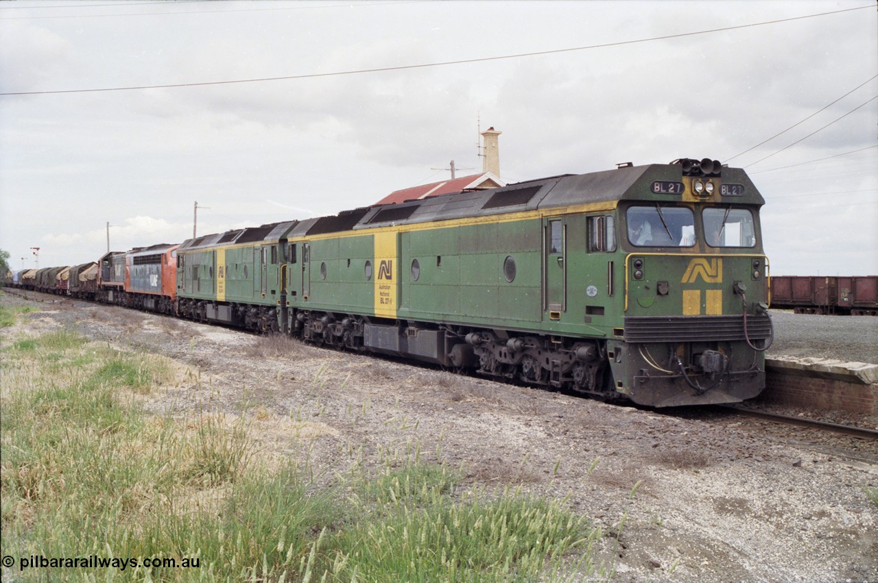 177-21
Gheringhap, down V/Line broad gauge goods train to Adelaide 9169 with the quad power combo of a pair of Australian National BL class locomotives BL 27 Clyde Engineering EMD model JT26C-2SS serial 83-1011 and class leader BL 26 'Bob Hawke' serial 83-1010 and V/Line S class S 313 'Alfred Deakin' Clyde Engineering EMD model A7 serial 61-230 and X class X 53 Clyde Engineering EMD model G26C serial 75-800, BL 27 had Paul Keating drawn on the LHS cab as it was just after he'd taken the Labor Party leadership and the Prime Ministership off Bob Hawke.
Keywords: BL-class;BL27;Clyde-Engineering-Rosewater-SA;EMD;JT26C-2SS;88-1011;