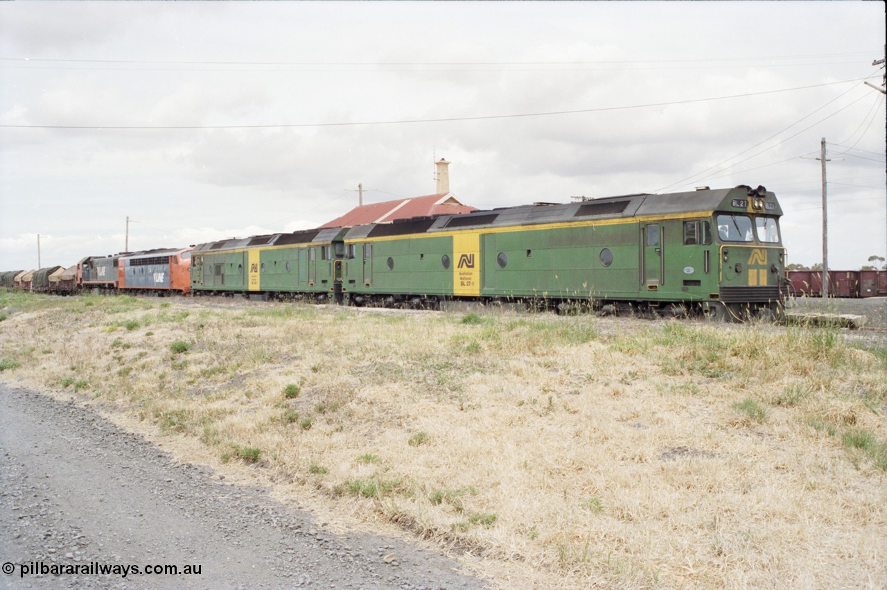 177-23
Gheringhap, down V/Line broad gauge goods train to Adelaide 9169 with the quad power combo of a pair of Australian National BL class locomotives BL 27 Clyde Engineering EMD model JT26C-2SS serial 83-1011 and class leader BL 26 'Bob Hawke' serial 83-1010 and V/Line S class S 313 'Alfred Deakin' Clyde Engineering EMD model A7 serial 61-230 and X class X 53 Clyde Engineering EMD model G26C serial 75-800, BL 27 had Paul Keating drawn on the LHS cab as it was just after he'd taken the Labor Party leadership and the Prime Ministership off Bob Hawke.
Keywords: BL-class;BL27;Clyde-Engineering-Rosewater-SA;EMD;JT26C-2SS;83-1011;