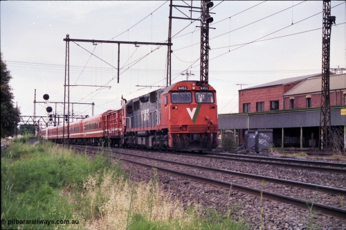 177-05
Newport Junction, V/Line broad gauge N class locomotive N 453 'City of Albury' Clyde Engineering EMD model JT22HC-2 serial 85-1221 leads an up Warrnambool passenger train with D van and 5 car Z set.
Keywords: N-class;N453;Clyde-Engineering-Somerton-Victoria;EMD;JT22HC-2;85-1221;
