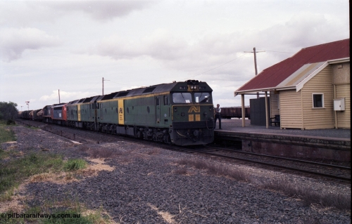 177-17
Gheringhap, down V/Line broad gauge goods train to Adelaide 9169 drifts to a stand as the driver surrenders the electric staff to the signaller for a train order, behind Australian National BL class locomotives BL 27 Clyde Engineering EMD model JT26C-2SS serial 83-1011 and class leader BL 26 'Bob Hawke' serial 83-1010 and V/Line S class S 313 'Alfred Deakin' Clyde Engineering EMD model A7 serial 61-230 and X class X 53 Clyde Engineering EMD model G26C serial 75-800.
Keywords: BL-class;BL27;Clyde-Engineering-Rosewater-SA;EMD;JT26C-2SS;83-1011;