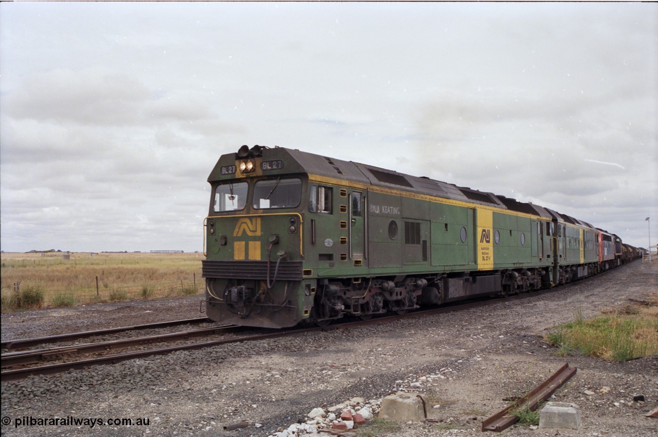 178-03
Cressy, down V/Line broad gauge goods train to Adelaide 9169 powers through the loop towards Ararat with the quad combo of a pair of Australian National BL class locomotives BL 27 Clyde Engineering EMD model JT26C-2SS serial 83-1011 and class leader BL 26 'Bob Hawke' serial 83-1010 with V/Line S class S 313 'Alfred Deakin' Clyde Engineering EMD model A7 serial 61-230 and X class X 53 Clyde Engineering EMD model G26C serial 75-800, BL 27 had Paul Keating drawn on the LHS cab as it was just after he'd taken the Labor Party leadership and the Prime Ministership off Bob Hawke.
Keywords: BL-class;BL27;Clyde-Engineering-Rosewater-SA;EMD;JT26C-2SS;88-1011;