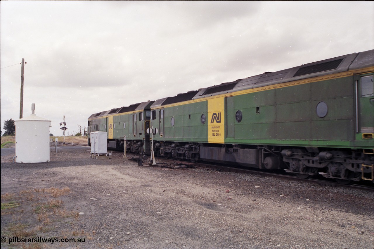 178-04
Cressy, down V/Line broad gauge goods train to Adelaide 9169 powers through the trailable points at the western end of the loop heading towards Ararat, Australian National BL class locomotives BL 27 Clyde Engineering EMD model JT26C-2SS serial 83-1011 and class leader BL 26 'Bob Hawke' serial 83-1010, BL 27 had Paul Keating drawn on the LHS cab as it was just after he'd taken the Labor Party leadership and the Prime Ministership off Bob Hawke.
