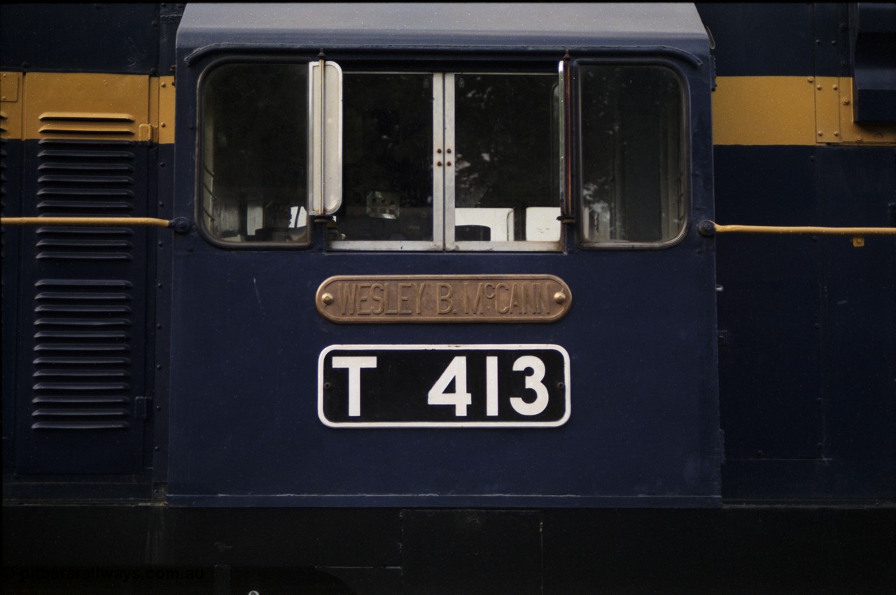 178-20
Ballarat East loco depot, former Australian Portland Cement loco, then bought by Victorian Railways and the only T class with a dynamic brake, T 413 'Wesley B. Mc Cann' Clyde Engineering EMD model G8B serial 56-107, cab side view of number and nameplate.
Keywords: T413;Clyde-Engineering-Granville-NSW;EMD;G8B;56-107;