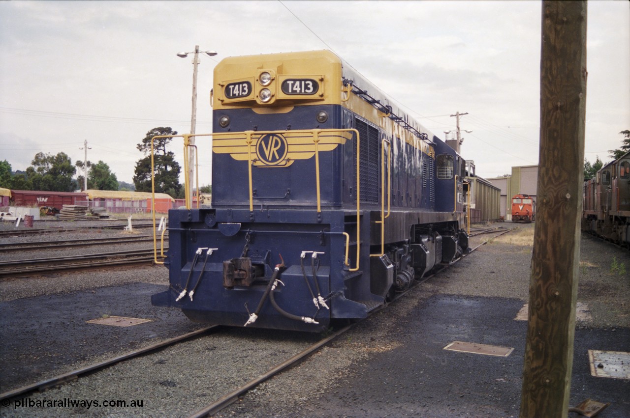 178-21
Ballarat East loco depot, former Australian Portland Cement loco, then bought by Victorian Railways and the only T class with a dynamic brake, T 413 'Wesley B. Mc Cann' Clyde Engineering EMD model G8B serial 56-107, long hood view.
Keywords: T-class;T413;Clyde-Engineering-Granville-NSW;EMD;G8B;56-107;