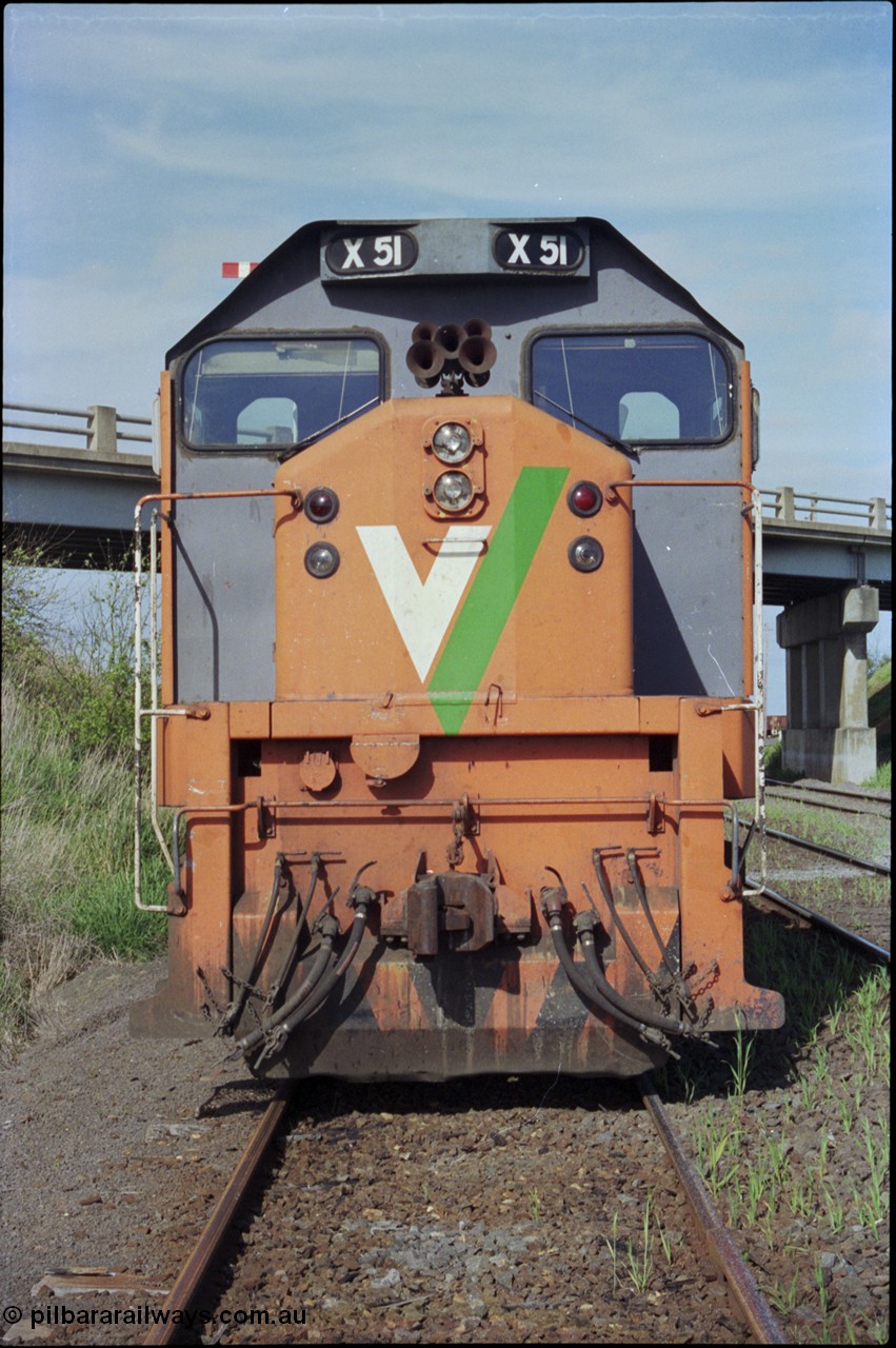 179-29
Gheringhap, Siding C, V/Line broad gauge X class X 51 Clyde Engineering EMD model G26C serial 75-798 sits awaiting some light engines from Geelong Loco to come and retrieve it, front view.
Keywords: X-class;X51;Clyde-Engineering-Rosewater-SA;EMD;G26C;75-798;