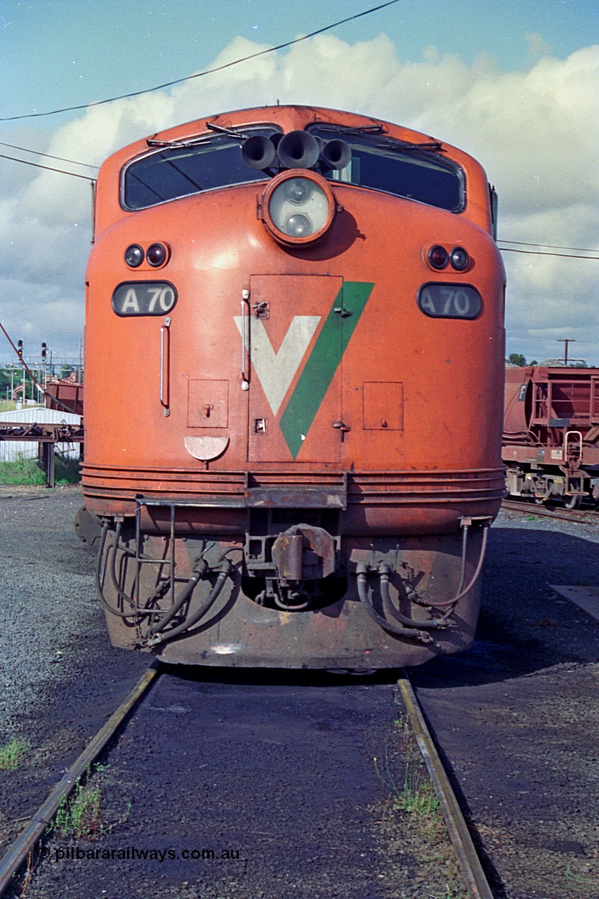 180-02
Seymour loco depot, broad gauge V/Line Bulldog locomotive A class A 70 Clyde Engineering EMD model AAT22C-2R serial 84-1187 rebuilt from B class B 70 Clyde Engineering EMD model ML2 serial ML2-11, cab front view.
Keywords: A-class;A70;Clyde-Engineering-Rosewater-SA;EMD;AAT22C-2R;84-1187;rebuild;bulldog;