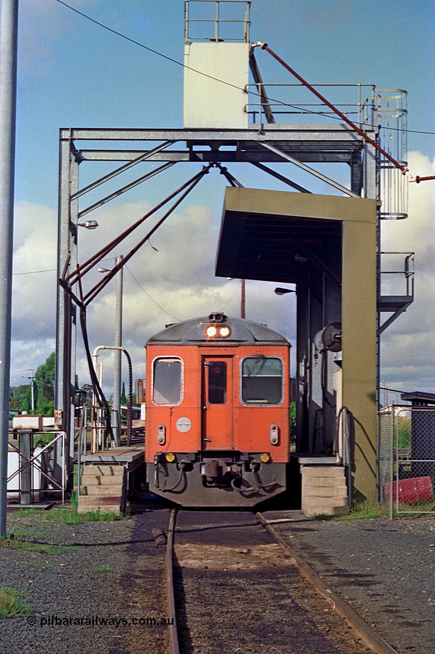 180-03
Seymour loco depot, fuel and sanding point, V/Line broad gauge Tulloch Ltd built DRC class diesel railcar DRC 40 takes on fuel having run a down Saturday morning passenger train from Melbourne.
Keywords: DRC-class;DRC40;Tulloch-Ltd-NSW;