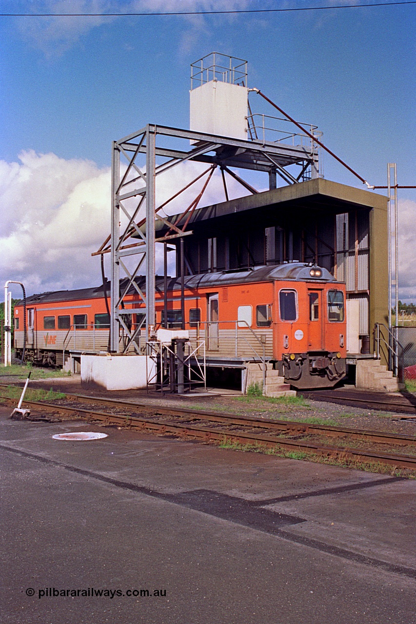 180-05
Seymour loco depot, fuel and sanding point, V/Line broad gauge Tulloch Ltd built DRC class diesel railcar DRC 40 takes on fuel having run a down Saturday morning passenger train from Melbourne.
Keywords: DRC-class;DRC40;Tulloch-Ltd-NSW;