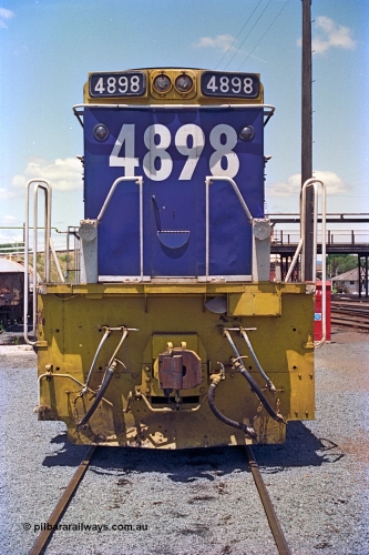 180-21
Albury, NSW, loco depot, NSWSRA standard gauge 48 class locomotive 4898 AE Goodwin ALCo model DL531 serial G3420-13 wearing Freight Rail livery rests near the fuel points, No.2 End front view.
Keywords: 48-class;4898;AE-Goodwin;ALCo;DL531;G3420-13;