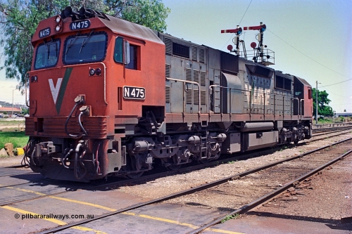 180-25
Wodonga, the last member of V/Line broad gauge N class fleet, N 475 'City of Moe' Clyde Engineering EMD model JT22HC-2 serial 87-1204 stands near the signal box shut down having bought the morning down passenger service from Melbourne.
Keywords: N-class;N475;Clyde-Engineering-Somerton-Victoria;EMD;JT22HC-2;87-1204;