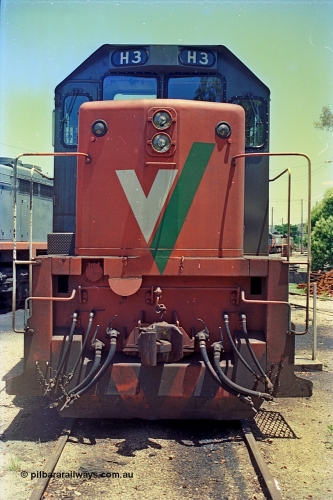 180-34
Wodonga turntable radial roads finds V/Line broad gauge H class loco H 3 Clyde Engineering EMD model G18B serial 68-631 resting between jobs, cab front view.
Keywords: H-class;H3;Clyde-Engineering-Granville-NSW;EMD;G18B;68-631;