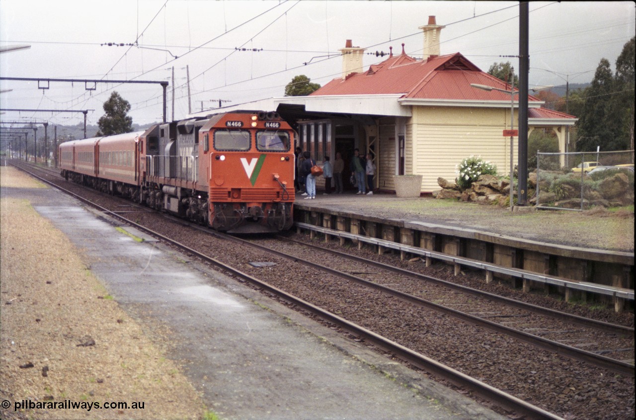 181-01
Trafalgar station, V/Line broad gauge up passenger train consisting of N class N 466 'City of Warrnambool' Clyde Engineering EMD model JT22HC-2 serial 86-1195 and N set slows to pick up passengers.
Keywords: N-class;N466;Clyde-Engineering-Somerton-Victoria;EMD;JT22HC-2;86-1195;