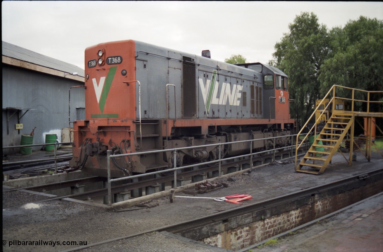 183-13
Seymour loco depot, V/Line broad gauge loco T class T 368 Clyde Engineering EMD model G8B serial 64-323 sits over the brake pit.
Keywords: T-class;T368;Clyde-Engineering-Granville-NSW;EMD;G8B;64-323;