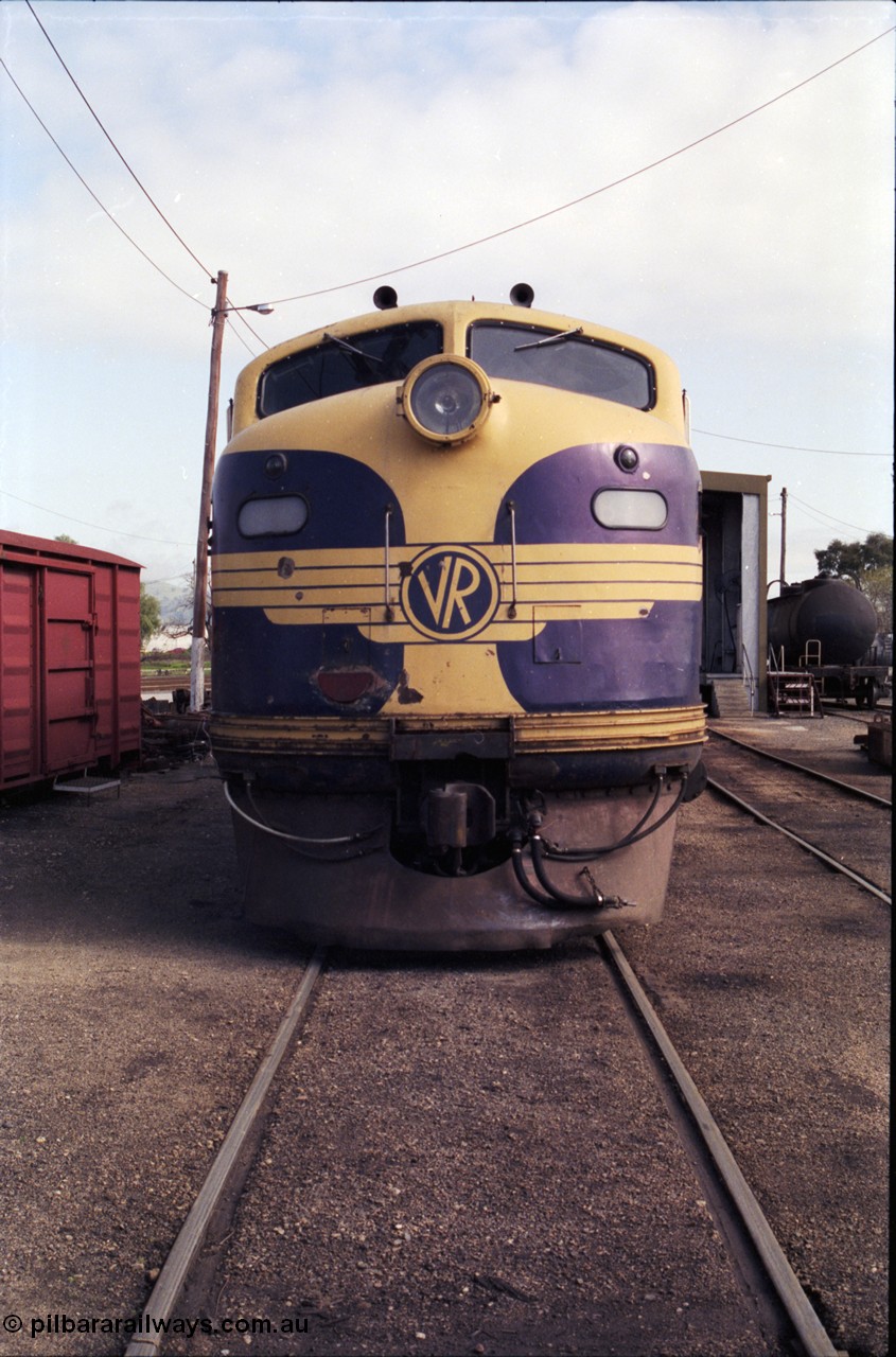 183-25
Wodonga loco depot fuel point, V/Line broad gauge Bulldog B class locomotive B 75 Clyde Engineering EMD model ML2 serial ML2-16 still in Victorian Railways livery, cab front view.
Keywords: B-class;B75;Clyde-Engineering-Granville-NSW;EMD;ML2;ML2-16;bulldog;