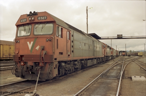 184-16
Albury loco depot fuel point, V/Line standard gauge locos lined up awaiting the Sunday run of goods trains back to Melbourne, G class G 527 Clyde Engineering EMD model JT26C-2SS serial 88-1257, C class C 503 Clyde Engineering EMD model GT26C serial 76-826, and G classes G 520 serial 85-1233, G 525 serial 86-1238 and G 523 Clyde Engineering EMD model JT26C-2SS serial 86-1236.
Keywords: G-class;G527;Clyde-Engineering-Somerton-Victoria;EMD;JT26C-2SS;88-1257;C-class;C503;GT26C;76-826;G520;85-1233;G525;86-1238;G523;86-1236;