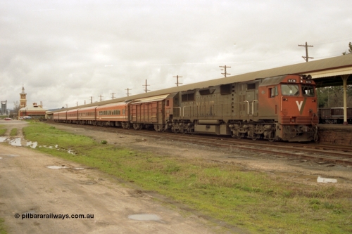 184-18
Albury station broad gauge platform overview, up V/Line passenger train with N class N 474 'City of Traralgon' Clyde Engineering EMD model JT22HC-2 serial 87-1203 D van and N set, station building in background.
Keywords: N-class;N474;Clyde-Engineering-Somerton-Victoria;EMD;JT22HC-2;87-1203;
