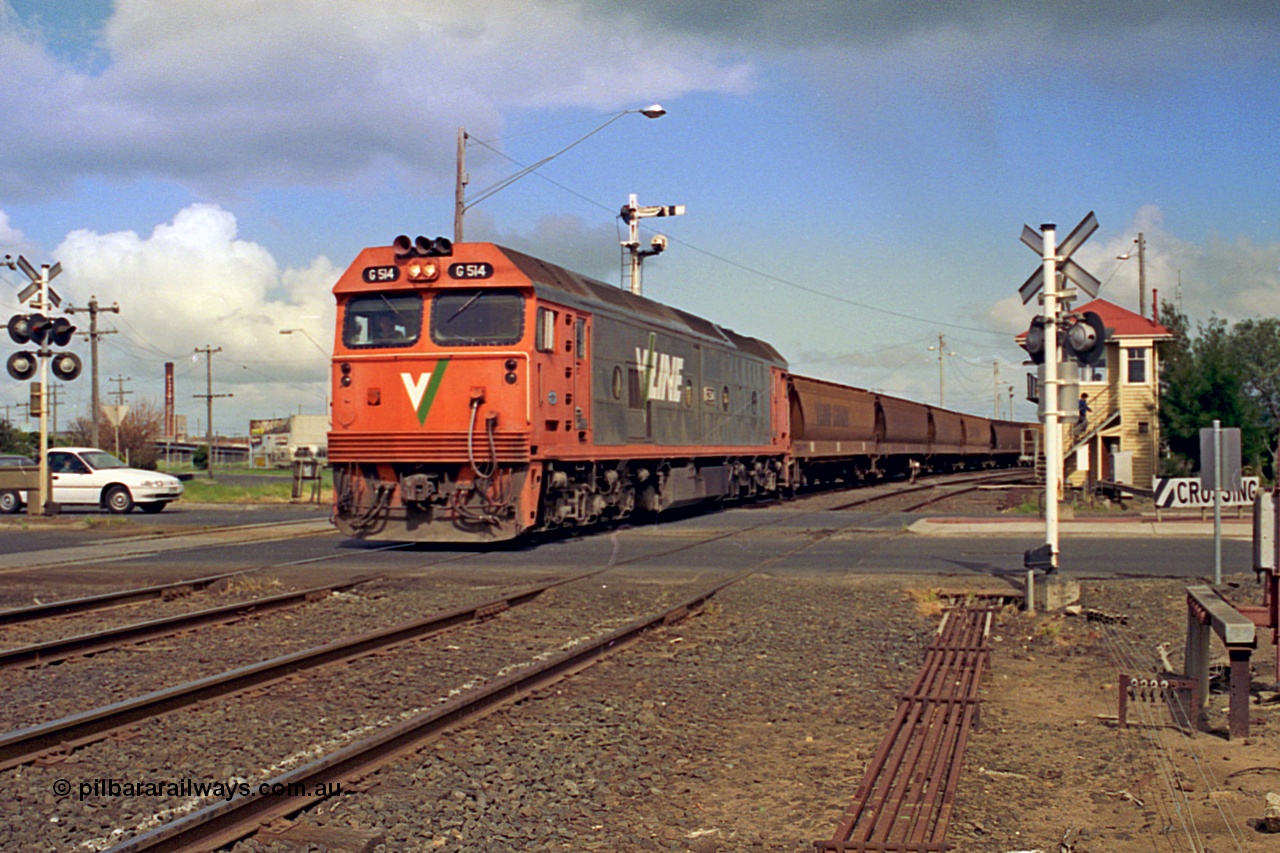 185-07
North Geelong C Box looking across the Separation Street grade crossing as a V/Line G class locomotive G 514 Clyde Engineering EMD model JT26C-2SS serial 85-1242 departs away from North Geelong Yard with 9121 empty grain train.
Keywords: G-class;G514;Clyde-Engineering-Rosewater-SA;EMD;JT26C-2SS;85-1242;