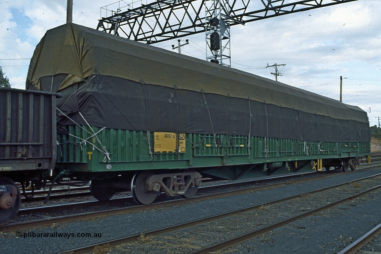 191-07
Seymour station yard south end, Australian National 52 tonne capacity open waggon ROOX type ROOX 3007, recoded from AOOX, one of two hundred GOX type open waggons built by Transfield WA in between 1974 and 1976.
Keywords: ROOX-type;ROOX3007;1974-76/200-170;Transfield-WA;GOX-type;AOOX-type;