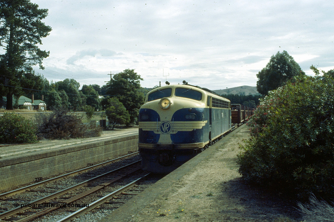 191-18
Kilmore East station platform, looking north, UP special sleeper discharge train behind Victorian Railways liveried B class B 65 Clyde Engineering EMD ML2 model serial ML2-6 glides through the platform.
Keywords: B-class;B65;Clyde-Engineering-Granville-NSW;EMD;ML2;ML2-6;bulldog;