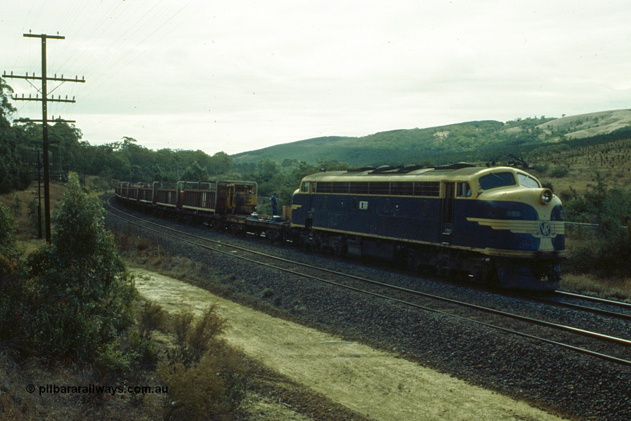 191-20
Kilmore East, Victorian Railways liveried B class B 65 Clyde Engineering EMD model ML2 serial ML2-6 leads an UP special sleeper discharge train as it discharges sleepers near the '37 mile' on a Sunday.
Keywords: B-class;B65;Clyde-Engineering-Granville-NSW;EMD;ML2;ML2-6;bulldog;