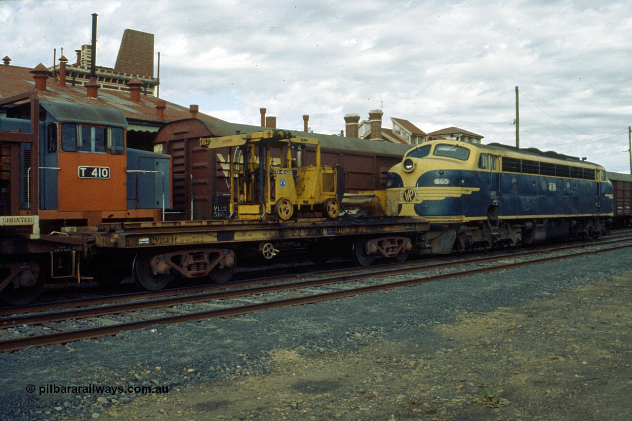 191-22
Wandong, O'Gradys Road grade crossing, near former Mathiesons Siding, Victorian Railways liveried B class B 65 Clyde Engineering EMD model ML2 serial ML2-6 leads an UP special sleeper discharge train as it discharges sleepers.
Keywords: B-class;B65;Clyde-Engineering-Granville-NSW;EMD;ML2;ML2-6;bulldog;