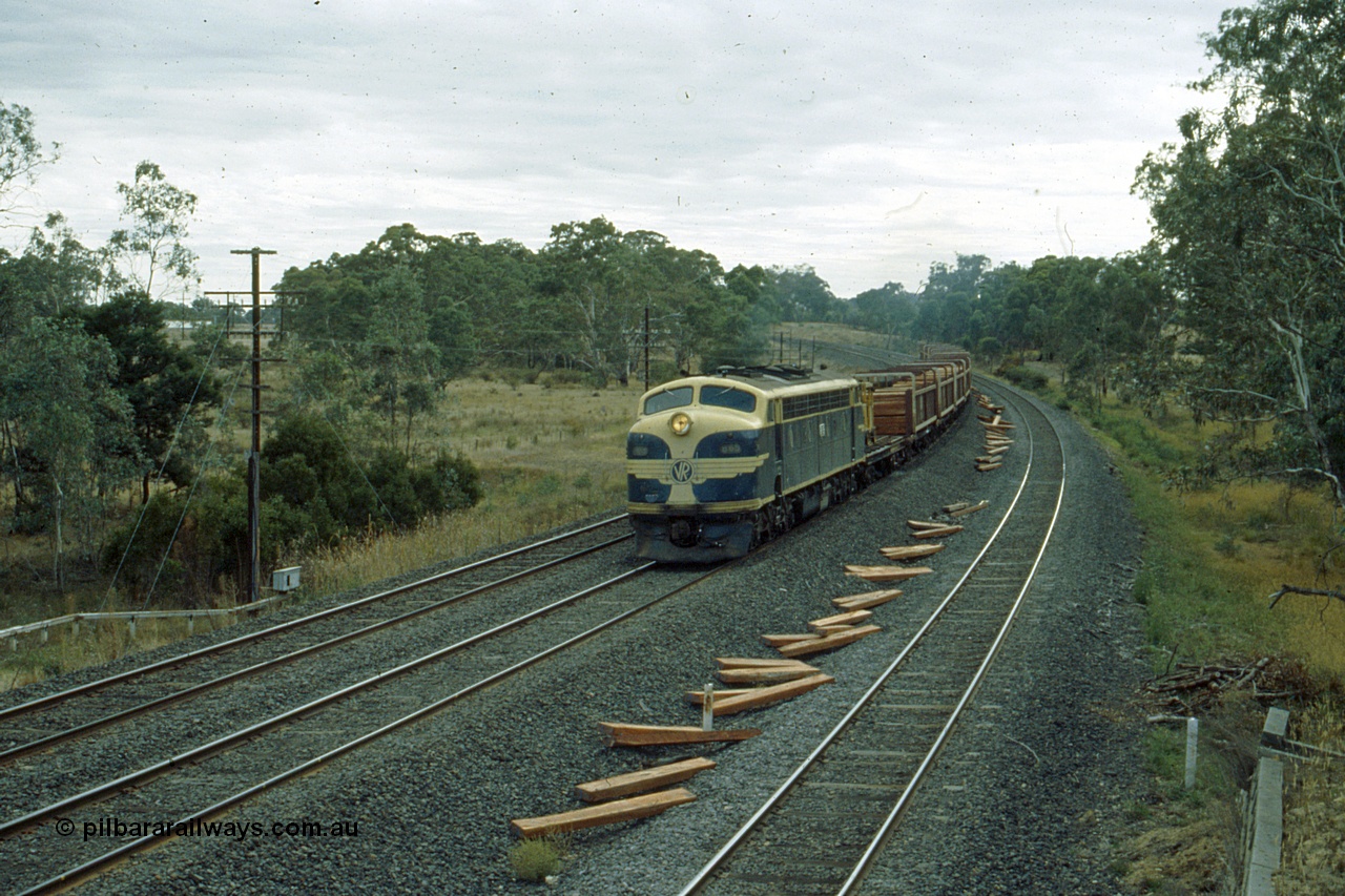 191-24
Wandong, O'Gradys Road grade crossing, an UP special sleeper discharge train seen as it discharges sleepers heading towards Wandong.
