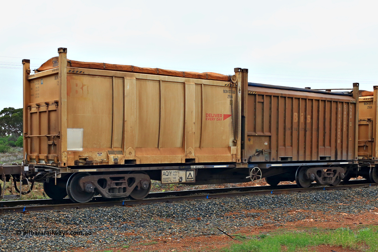 240401 4969
Kalgoorlie, Aurizon's 1029 Malcolm Freighter, waggon AQIY 00027 loaded with two 20' roll top containers, a 25UA type Bis Deliver Every Day BICN 107400 [2] and a 55UA Bis Industries SBIU 200605 [6]. The AQIY were originally built as the CQYY but CFCLA did not buy them, Bradken then stored them as KQYY. When Aurizon bought them they had the handbrake relocated to the middle of the waggon from the end. 1st of April 2024.
Keywords: AQIY-type;AQIY00027;Bradken;CQYY-type;KQYY-type;