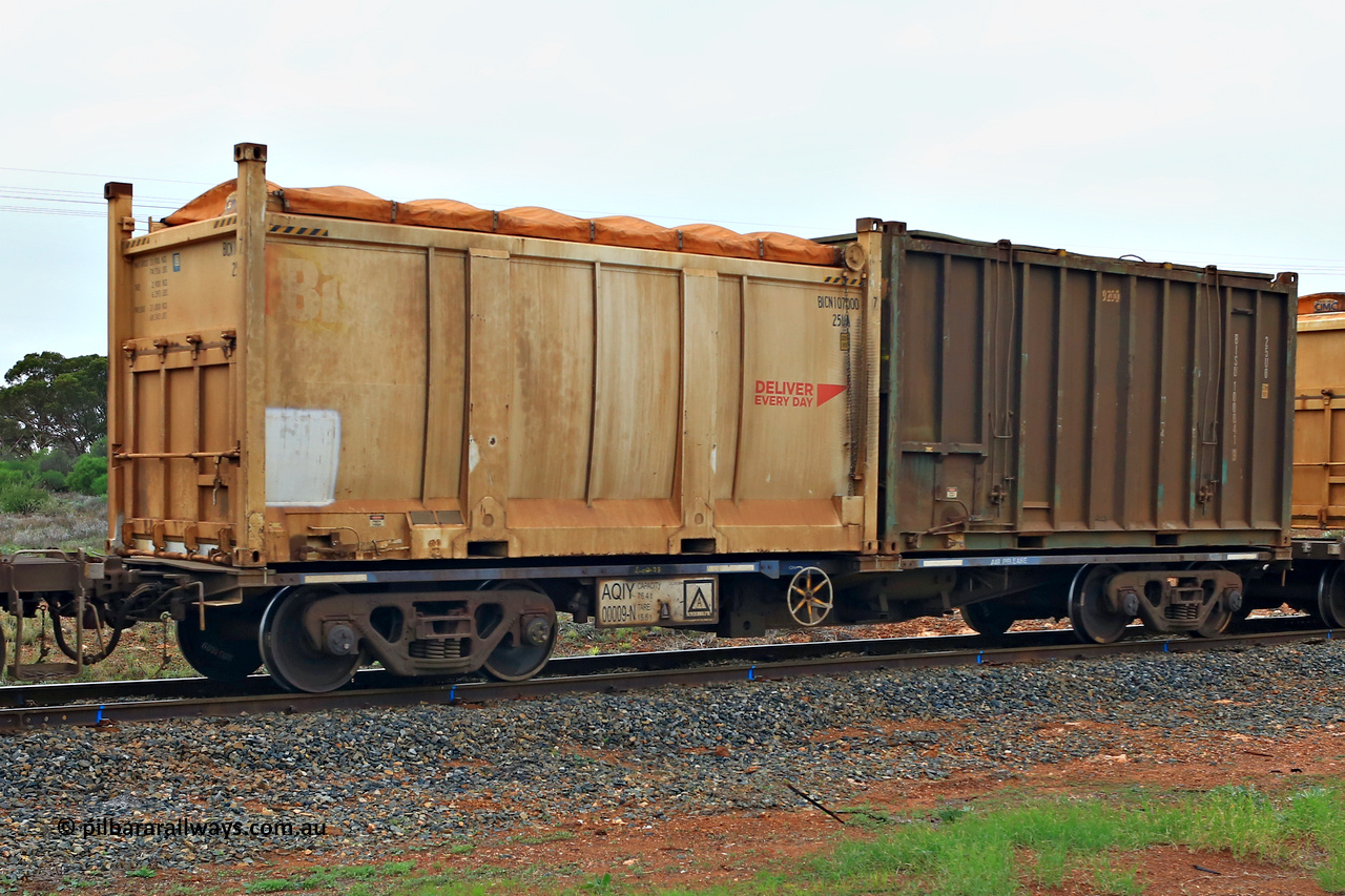 240401 4980
Kalgoorlie, Aurizon's 1029 Malcolm Freighter, waggon AQIY 00009 loaded with two 20' sulphur containers, a 25UA type roll top Bis Deliver Every Day BICN 107000 [7] and a 25U0 hard top BISU 100041 [9]. The AQIY started life built by Bradken and coded CQYY but CFCLA never bought them, so Bradken coded them KQYY and stored them. When Aurizon bought them they had the handbrake relocated to the middle of the waggon from the end. 1st of April 2024.
Keywords: AQIY-type;AQIY00009;Bradken;CQYY-type;KQYY-type;