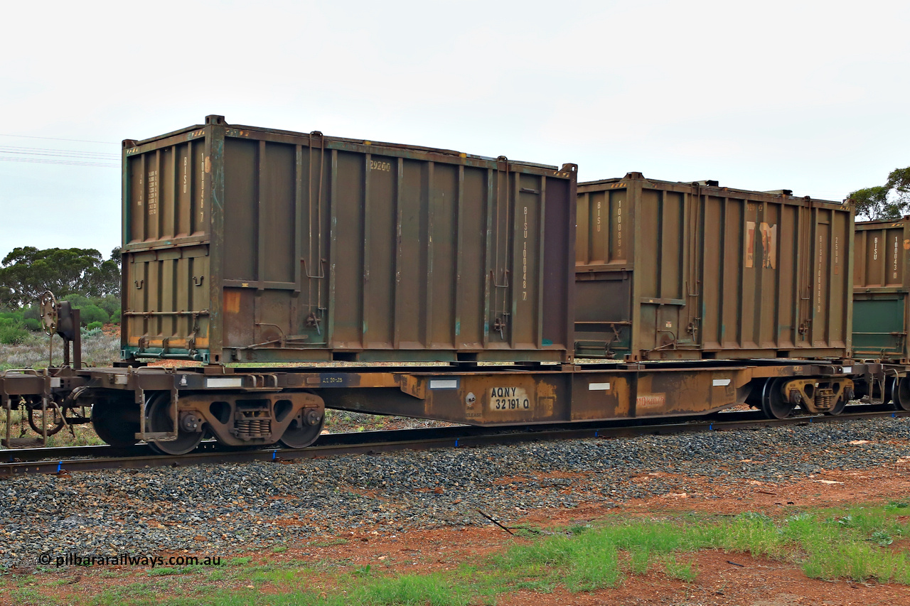 240401 4982
Kalgoorlie, Aurizon's 1029 Malcolm Freighter, waggon AQNY 32191, one of sixty two waggons built by Goninan WA in 1998 as the WQN type for Murrin Murrin container traffic loaded with two 20' 25U0 type hard tops, BISU 100048 [7] and Bis Industries BISU 100089 [3]. Note the two different door styles. 1st of April 2024.
Keywords: AQNY-type;AQNY32191;Goninan-WA;WQN-type;