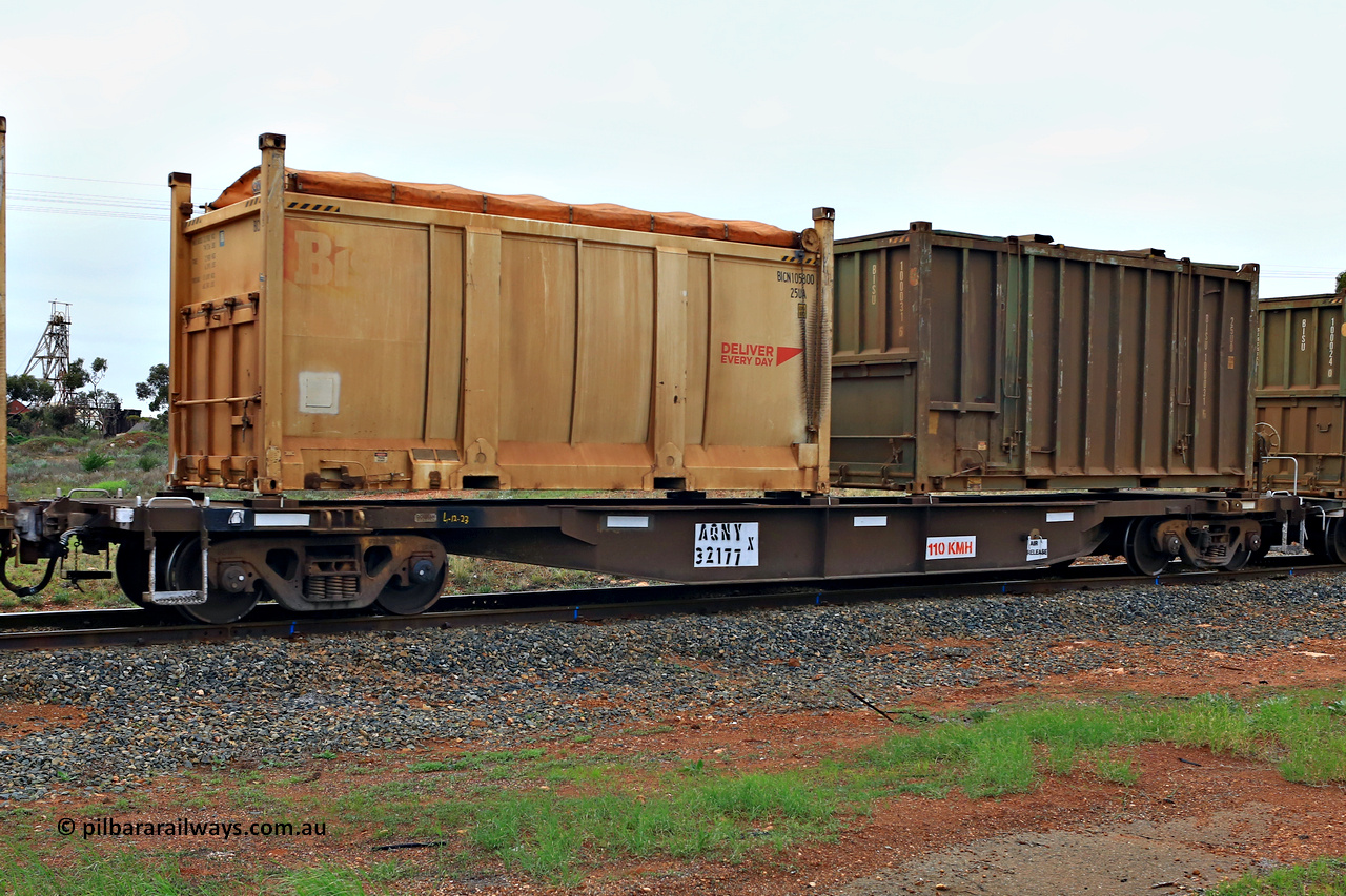 240401 4990
Kalgoorlie, Aurizon's 1029 Malcolm Freighter, waggon AQNY 32177, one of sixty two waggons built by Goninan WA in 1998 as the WQN type for Murrin Murrin container traffic loaded with two 20' sulphur containers, a Bis Deliver Every Day 25UA roll top BICN 105800 [1] and a 25U0 type hard top BISU 100031 [6]. 1st of April 2024.
Keywords: AQNY-type;AQNY32177;Goninan-WA;WQN-type;
