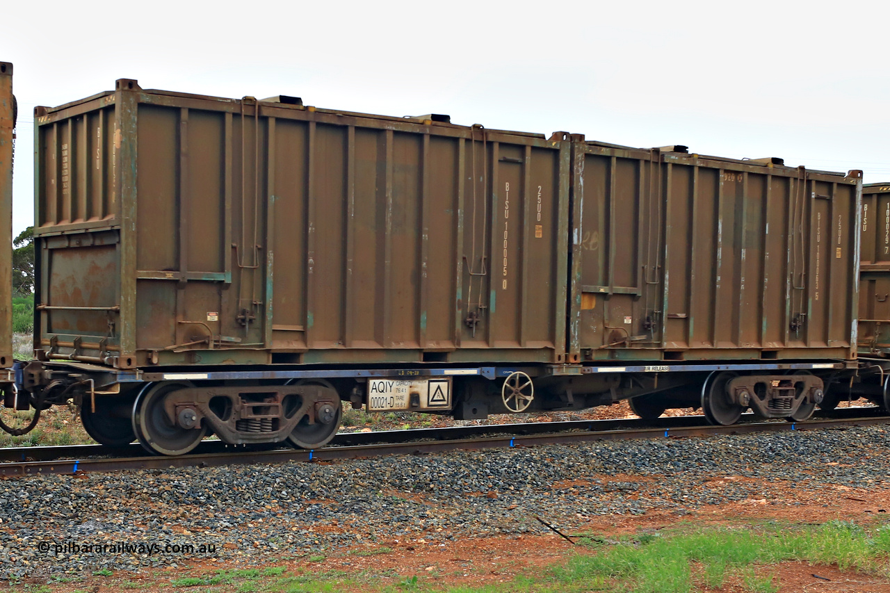 240401 4992
Kalgoorlie, Aurizon's 1029 Malcolm Freighter, waggon AQIY 00021 loaded with two 20' 25U0 type hard top sulphur containers BISU 100005 [0] and BISU 100063 [5]. The AQIY were originally built as the CQYY but CFCLA did not buy them, Bradken then stored them as KQYY. When Aurizon bought them they had the handbrake relocated to the middle of the waggon from the end. 1st of April 2024.
Keywords: AQIY-type;AQIY00021;Bradken;CQYY-type;KQYY-type;