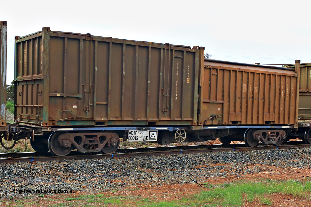 240401 4993
Kalgoorlie, Aurizon's 1029 Malcolm Freighter, waggon AQIY 00012 loaded with two 20' sulphur containers, a 25U0 hard top BISU 100029 [7] and a 55UA roll top Bis Industries SBIU 200620 [4]. The AQIY were originally built as the CQYY but CFCLA did not buy them, Bradken then stored them as KQYY. When Aurizon bought them they had the handbrake relocated to the middle of the waggon from the end. 1st of April 2024.
Keywords: AQIY-type;AQIY00012;Bradken;CQYY-type;KQYY-type;
