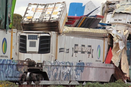 260901 7682
RRRY 7005 platform #3 with damaged top box. Was part of train 1MP5 which was backed up the Esperance line and struck Lefroy Bridge, August 31, 2026.
P3T LTCD 462128	RFRG Lindsay Transport reefer
P3B LTCD 461804 RFRG Lindsay Transport reefer
Keywords: Peter-D-Image;RRRY-type;RRRY7003;1PM5