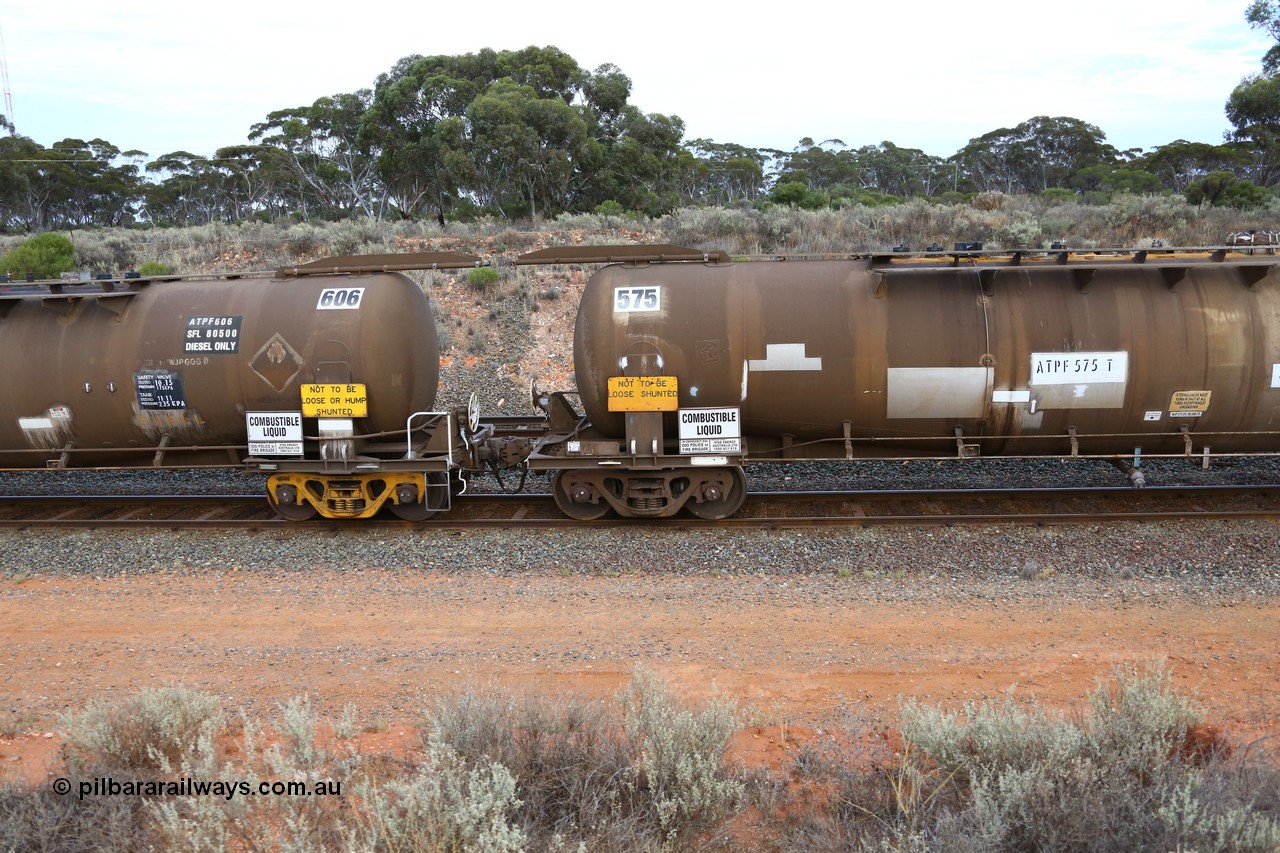 161116 5104
West Kalgoorlie, Shell fuel train 3442, tank waggon ATPF 606, built by Westrail Midland Workshops 1982 for Shell as type WJP 80.66 kL one compartment one dome. Shows type F InterLock couplers between ATPF 606 and ATPF 575.
Keywords: ATPF-type;ATPF606;Westrail-Midland-WS;WJP-type;