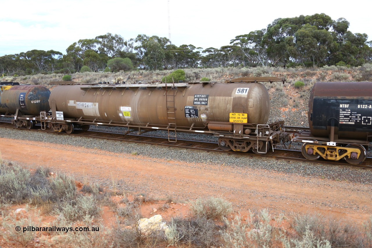 161116 5107
West Kalgoorlie, Shell fuel train 3442, ATPF type fuel tank waggon ATPF 581 built by WAGR Midland Workshops 1976 for Shell as type WJP 80.66 kL one compartment one dome, fitted with type F InterLock couplers, NTBF has standard E type.
Keywords: ATPF-type;ATPF581;WAGR-Midland-WS;WJP-type;JPC-type;