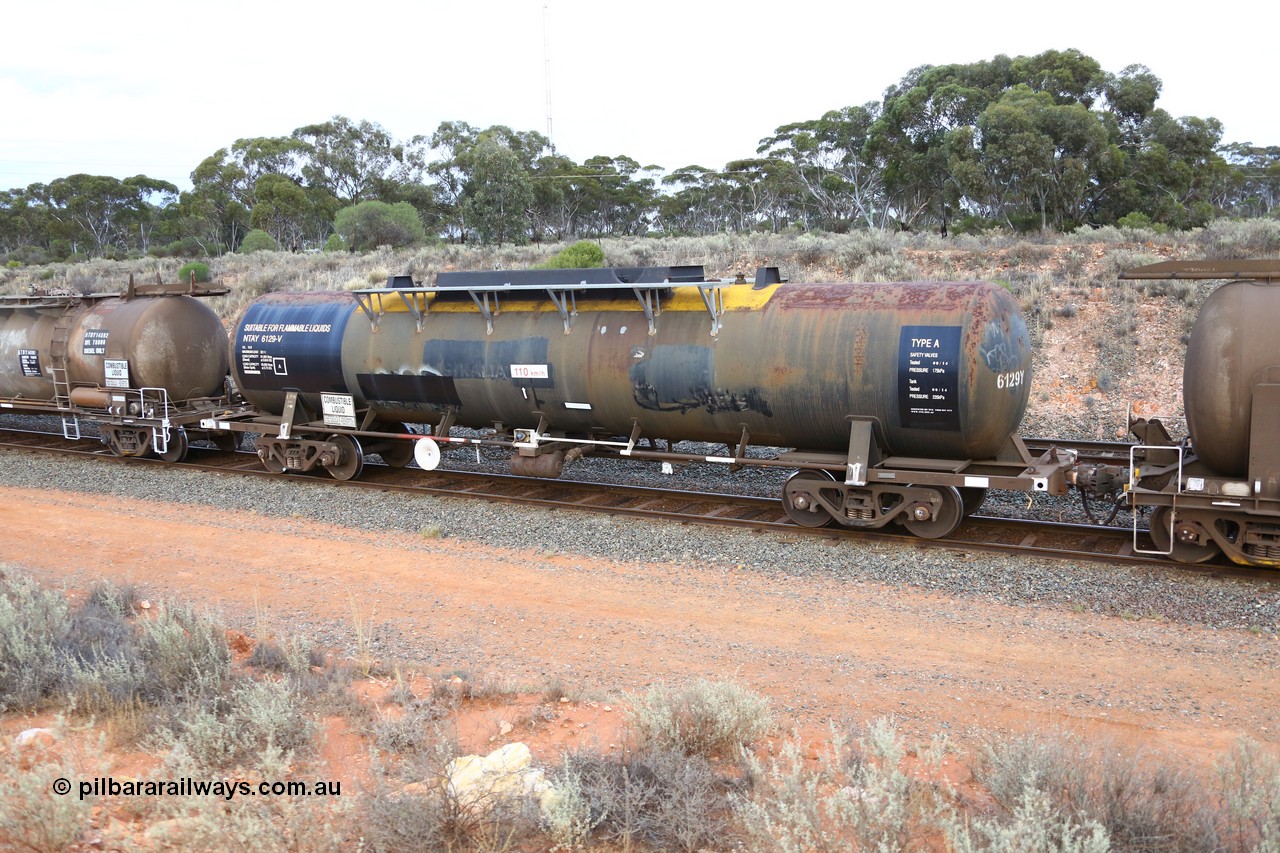 161116 5108
West Kalgoorlie, Shell fuel train 3442, NTAY type tank waggon NTAY 6129, built by Industrial Engineering Qld in 1976 as an SCA type SCA 280 for Shell. Recoded to NTAF 280, then 6129, capacity of 61,300 litres, former owner lettering for Freight Australia visible, note normal E type coupler, ATPF has type F InterLock.
Keywords: NTAY-type;NTAY6129;Indeng-Qld;SCA-type;SCA280;NTAF-type;