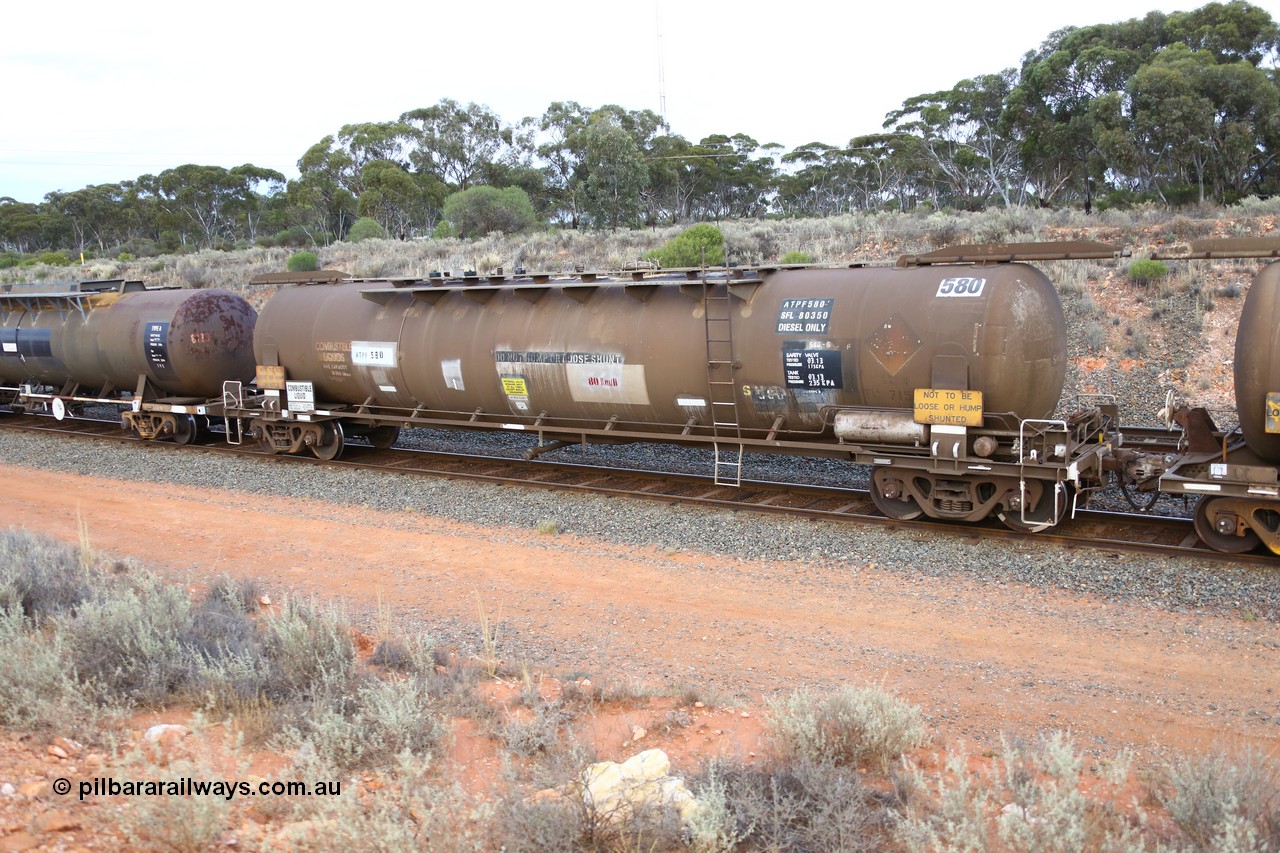 161116 5119
West Kalgoorlie, Shell fuel train 3442, ATPF 580 fuel tank waggon built by WAGR Midland Workshops 1976 for Shell as type WJP, 80.66 kL one compartment one dome, capacity of 80500 litres, it also spent time in SA in 1985, fitted with type F InterLock couplers, Shell Fleet no. TR715 still visible.
Keywords: ATPF-type;ATPF580;WAGR-Midland-WS;WJP-type;