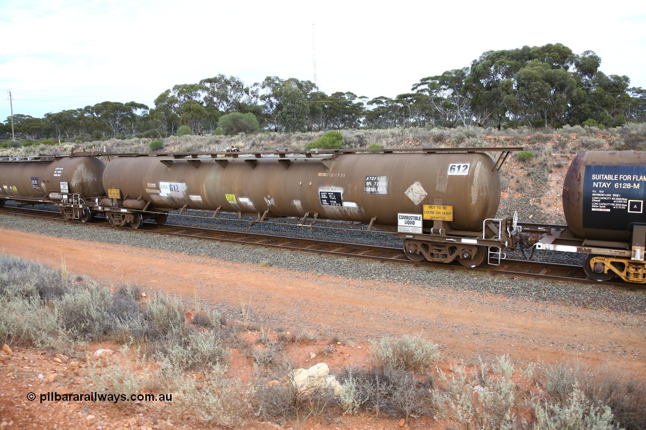 161116 5121
West Kalgoorlie, Shell fuel train 3442, ATQF type tank waggon ATQF 612, built by Indeng Qld 1982 for Shell as type WJQ, 73.34 kL one compartment one dome, Shell Fleet no. TR721, fitted with type F InterLock couplers.
Keywords: ATQF-type;ATQF612;Indeng-Qld;WJQ-type;